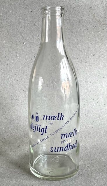Mælkeflaske med tryk